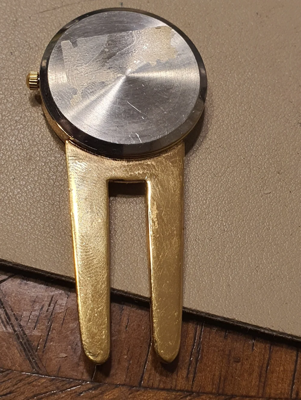 10/$20 Delta Faucet Company Goldtone/White Divot Repair Tool Watch